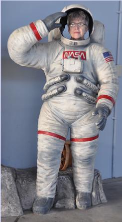 Loretta Hall posing as an astronaut